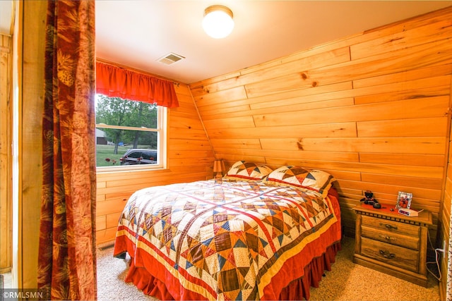 66893 185th Pl, Jacobson, MN 55752 - bedroom with carpet floors and wooden walls