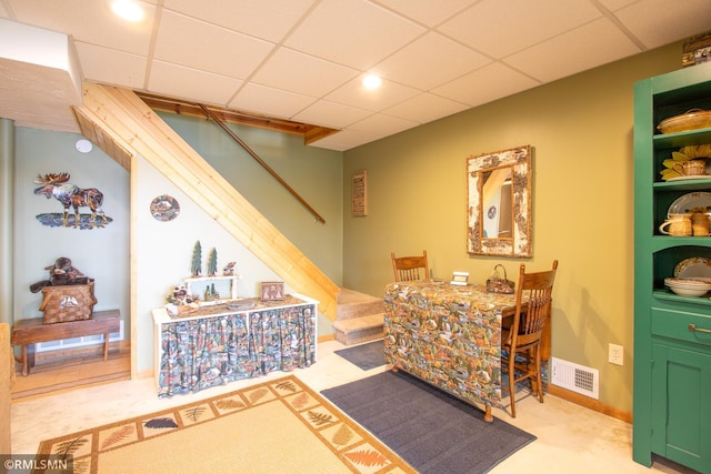 66893 185th Pl, Jacobson, MN 55752 - dining area with stairway, carpet flooring, a paneled ceiling, and recessed lighting