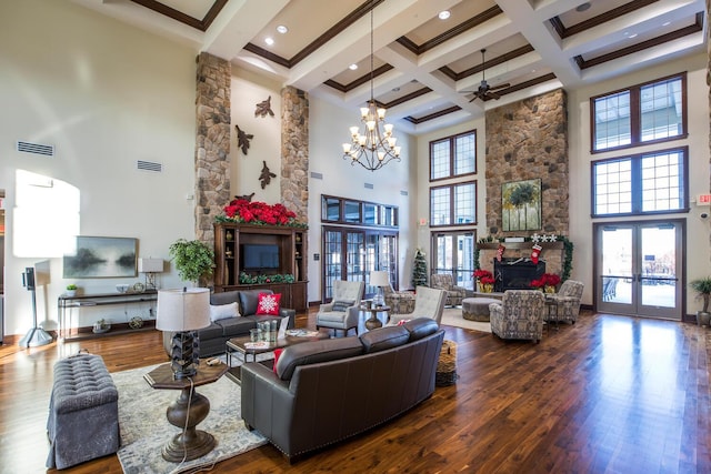 18147 73rd Pl N, Maple Grove, MN 55311 - living area with a high ceiling, beam ceiling, wood-type flooring, a ceiling fan, and a chandelier