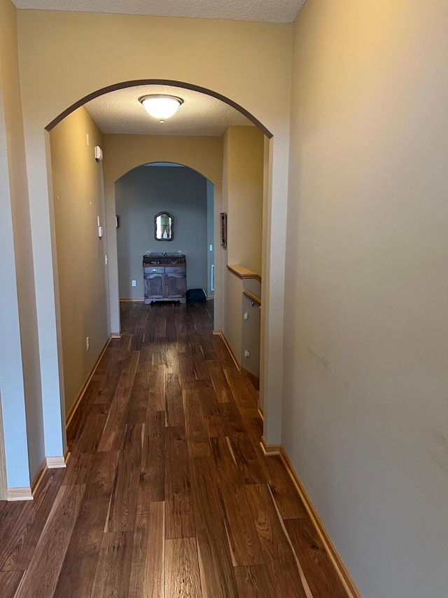 18147 73rd Pl N, Maple Grove, MN 55311 - hallway with arched walkways and wood finished floors