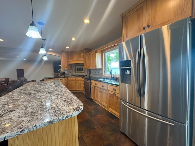 25797 Silver Beach Rd, Minnewaska Twp, MN 56334 - kitchen featuring stainless steel appliances, a sink, dark stone finish floors, tasteful backsplash, and dark stone countertops