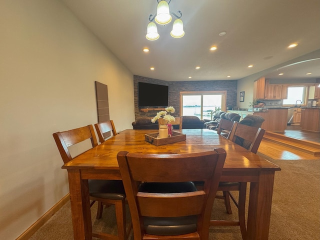 25797 Silver Beach Rd, Minnewaska Twp, MN 56334 - dining space with healthy amount of natural light, light carpet, recessed lighting, and baseboards