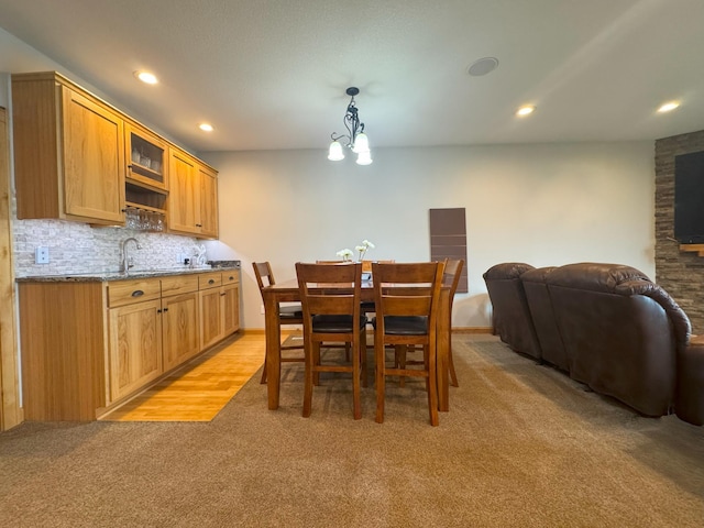 25797 Silver Beach Rd, Minnewaska Twp, MN 56334 - dining room featuring light carpet, recessed lighting, and baseboards