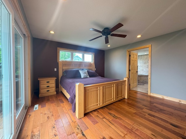 25797 Silver Beach Rd, Minnewaska Twp, MN 56334 - bedroom featuring light wood-style flooring, recessed lighting, baseboards, ensuite bathroom, and ceiling fan