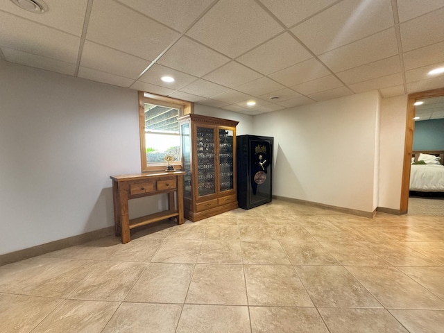 25797 Silver Beach Rd, Minnewaska Twp, MN 56334 - spare room with light tile patterned floors, a drop ceiling, recessed lighting, and baseboards