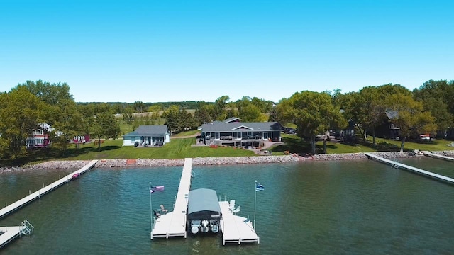 25797 Silver Beach Rd, Minnewaska Twp, MN 56334 - dock area with a water view and a yard