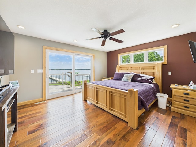 25797 Silver Beach Rd, Minnewaska Twp, MN 56334 - bedroom with access to outside, hardwood / wood-style flooring, recessed lighting, and ceiling fan