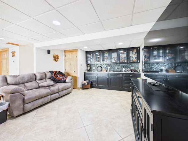 25797 Silver Beach Rd, Minnewaska Twp, MN 56334 - living area with wet bar, light tile patterned floors, a paneled ceiling, and recessed lighting