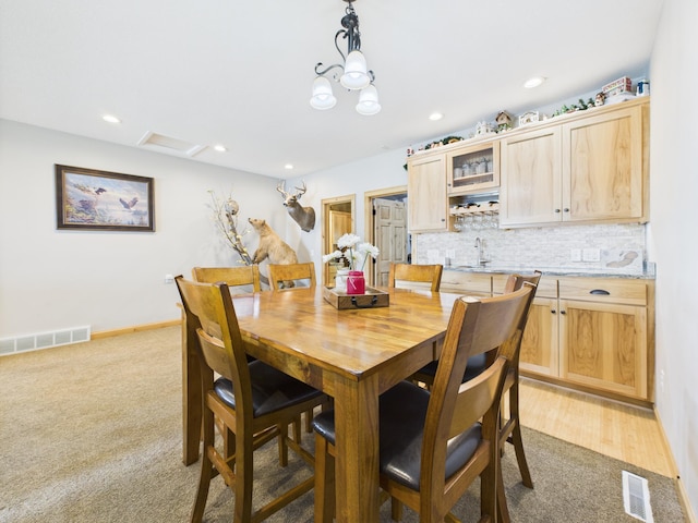 25797 Silver Beach Rd, Minnewaska Twp, MN 56334 - dining room featuring light colored carpet and recessed lighting