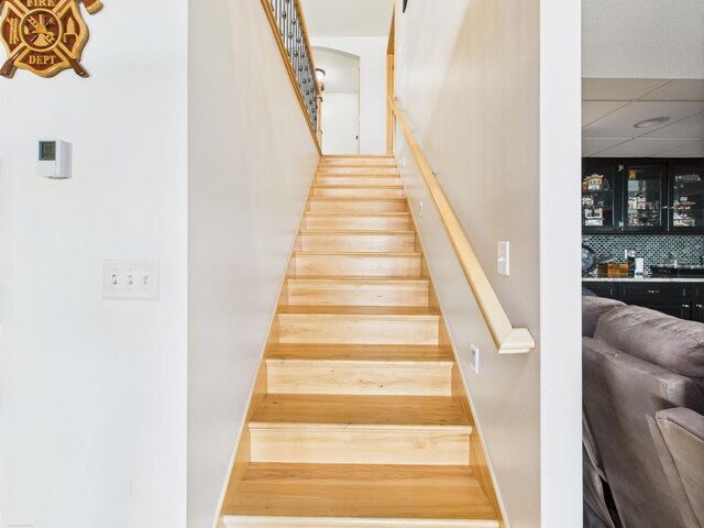 25797 Silver Beach Rd, Minnewaska Twp, MN 56334 - stairway featuring bar