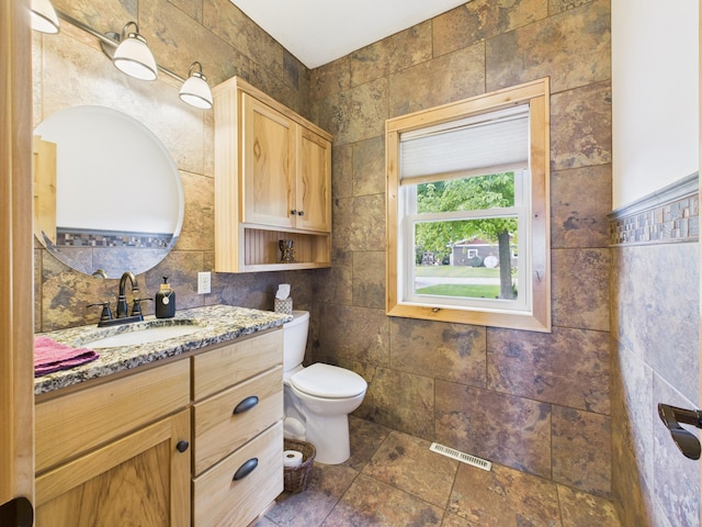 25797 Silver Beach Rd, Minnewaska Twp, MN 56334 - bathroom with vanity and tile walls