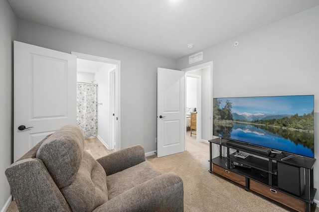 3011 Rum River Way, Anoka, MN 55303 - sitting room featuring baseboards and light carpet