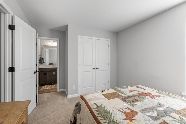 3011 Rum River Way, Anoka, MN 55303 - bedroom with light carpet, a closet, and baseboards