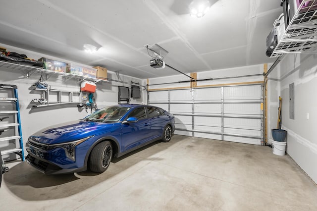3011 Rum River Way, Anoka, MN 55303 - garage with a garage door opener and electric panel