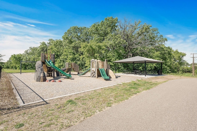 3011 Rum River Way, Anoka, MN 55303 - community jungle gym with a gazebo and view of wooded area