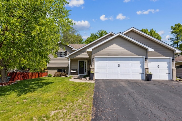 805 Natalie Dr, Buffalo, MN 55313 - tri-level home featuring driveway and an attached garage