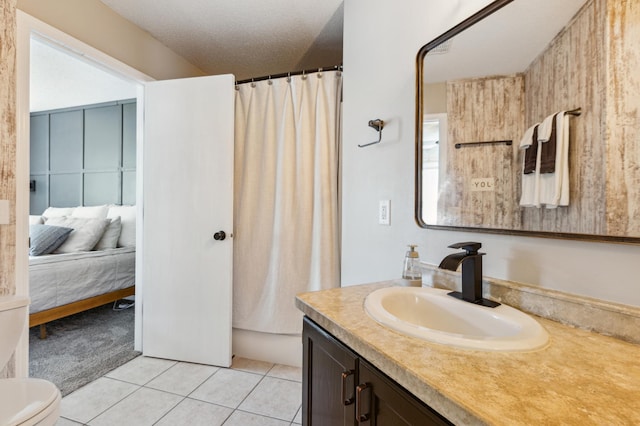 805 Natalie Dr, Buffalo, MN 55313 - bathroom with vanity, tile patterned flooring, ensuite bathroom, toilet, and curtained shower