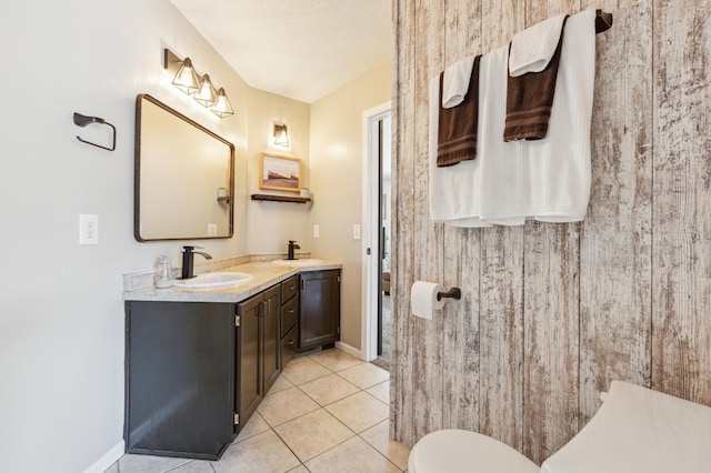 805 Natalie Dr, Buffalo, MN 55313 - full bathroom featuring double vanity, tile patterned floors, toilet, and baseboards