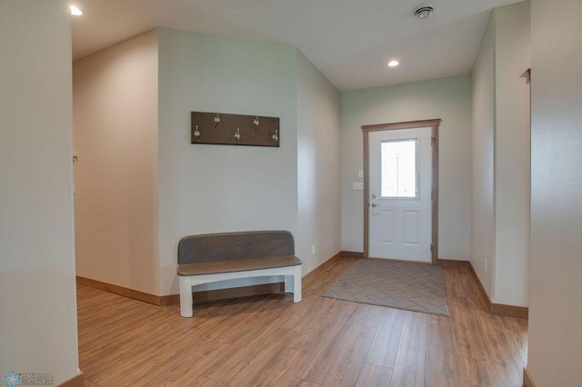 1908 65th Ave S, Fargo, ND 58104 - entrance foyer with wood finished floors, baseboards, and recessed lighting