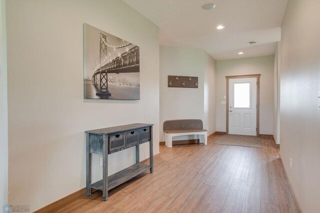 1908 65th Ave S, Fargo, ND 58104 - foyer entrance with wood finished floors, baseboards, and recessed lighting