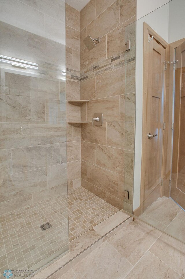1908 65th Ave S, Fargo, ND 58104 - full bathroom featuring a stall shower