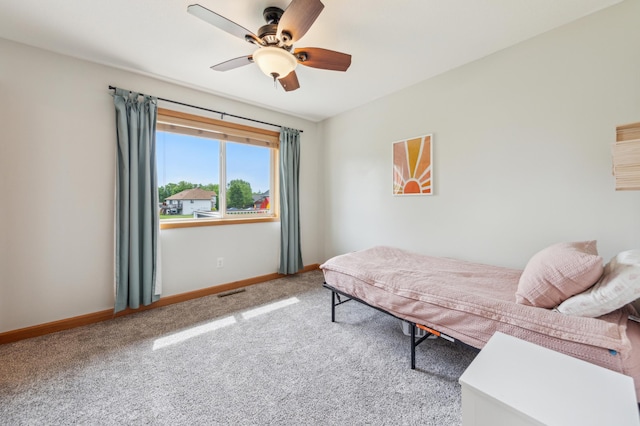30259 Fox Run Rd, Stacy, MN 55079 - carpeted bedroom with baseboards and ceiling fan