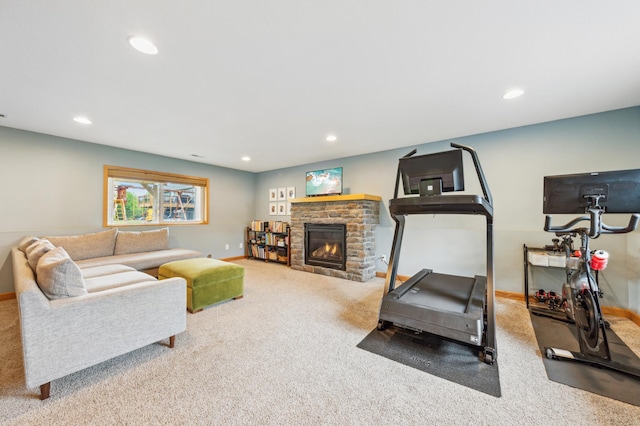 30259 Fox Run Rd, Stacy, MN 55079 - living room featuring carpet floors, recessed lighting, baseboards, and a glass covered fireplace
