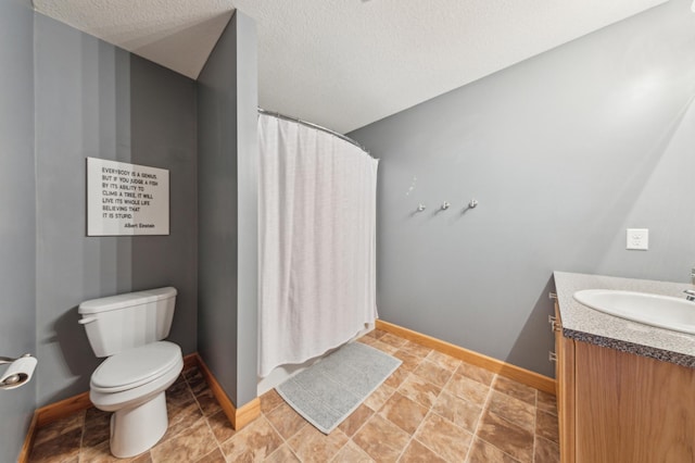 30259 Fox Run Rd, Stacy, MN 55079 - bathroom featuring toilet, vanity, baseboards, curtained shower, and a textured ceiling