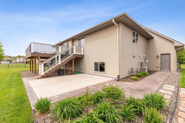 30259 Fox Run Rd, Stacy, MN 55079 - rear view of house with a patio, a wooden deck, and stairway