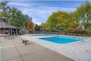 4819 Grenwich Way N, Oakdale, MN 55128 - community pool featuring a patio