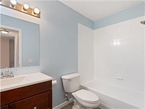 4819 Grenwich Way N, Oakdale, MN 55128 - bathroom featuring vanity, toilet, and  shower combination