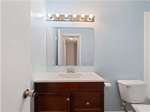 4819 Grenwich Way N, Oakdale, MN 55128 - bathroom featuring vanity and toilet