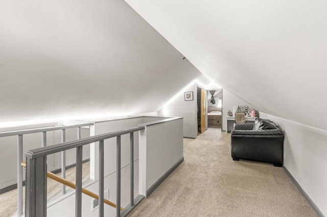 469 Little Canada Rd E, Little Canada, MN 55117 - additional living space with vaulted ceiling and light colored carpet