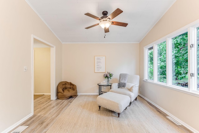 5725 Golden Valley Rd, Golden Valley, MN 55422 - sitting room featuring ceiling fan, wood finished floors, crown molding, baseboards, and vaulted ceiling