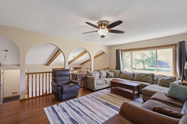 720 Tanglewood Dr, Shoreview, MN 55126 - living room featuring a ceiling fan, wood finished floors, and a textured ceiling