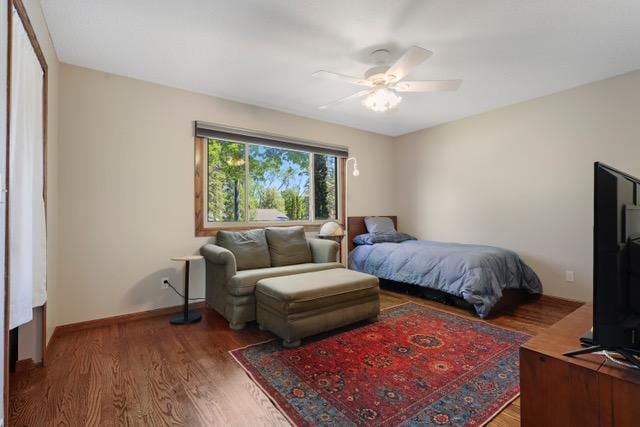 720 Tanglewood Dr, Shoreview, MN 55126 - bedroom featuring wood finished floors and a ceiling fan