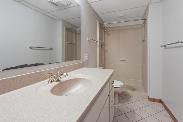 720 Tanglewood Dr, Shoreview, MN 55126 - full bath featuring a stall shower, tile patterned floors, vanity, and toilet