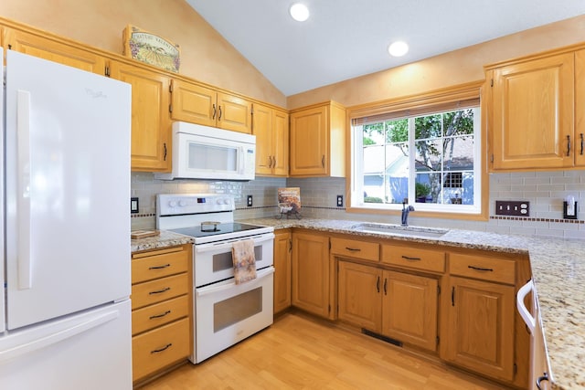 9149 Farnsworth Ave N, Brooklyn Park, MN 55443 - kitchen featuring white appliances, a sink, lofted ceiling, light wood-style floors, and backsplash
