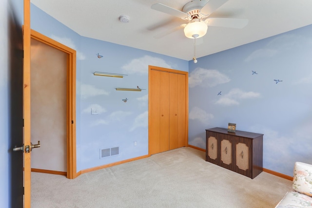 9149 Farnsworth Ave N, Brooklyn Park, MN 55443 - unfurnished bedroom with carpet, baseboards, a closet, and ceiling fan