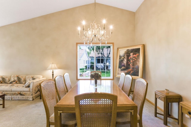 9149 Farnsworth Ave N, Brooklyn Park, MN 55443 - dining room featuring carpet, a chandelier, and vaulted ceiling