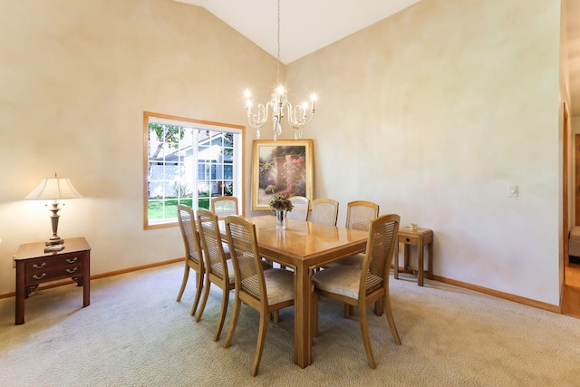 9149 Farnsworth Ave N, Brooklyn Park, MN 55443 - dining space featuring baseboards, light colored carpet, a chandelier, and high vaulted ceiling