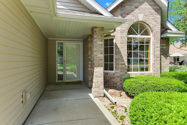9149 Farnsworth Ave N, Brooklyn Park, MN 55443 - property entrance with brick siding