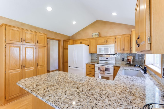 9149 Farnsworth Ave N, Brooklyn Park, MN 55443 - kitchen with white appliances, a sink, light stone countertops, a peninsula, and backsplash