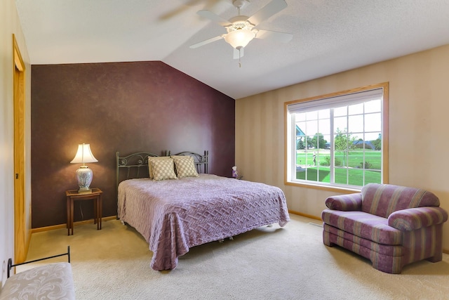 9149 Farnsworth Ave N, Brooklyn Park, MN 55443 - bedroom with carpet, baseboards, vaulted ceiling, a ceiling fan, and an accent wall