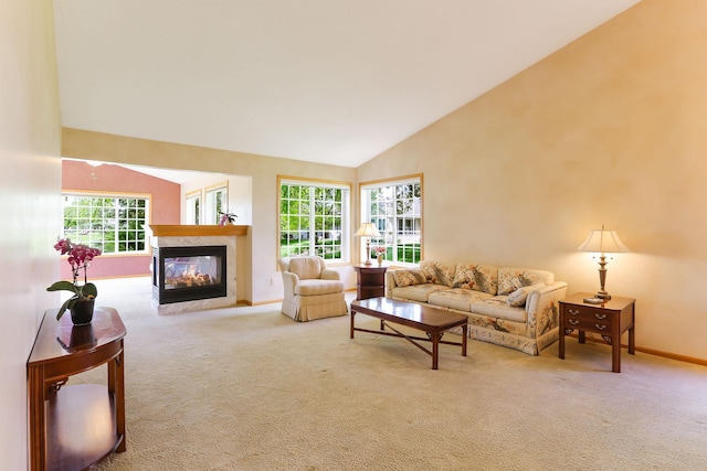 9149 Farnsworth Ave N, Brooklyn Park, MN 55443 - carpeted living area with baseboards, a multi sided fireplace, and high vaulted ceiling