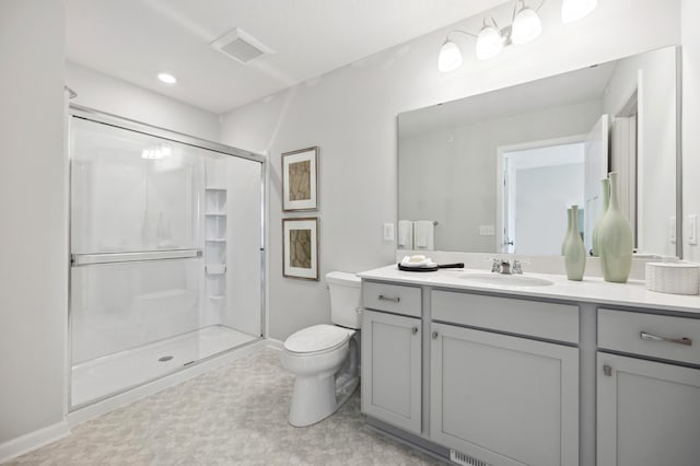 23221 Creekview Ct, Rogers, MN 55374 - bathroom featuring toilet, vanity, a stall shower, and baseboards
