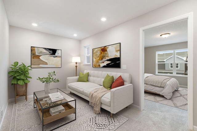 23225 Creekview Ct, Rogers, MN 55374 - carpeted living area featuring recessed lighting and baseboards