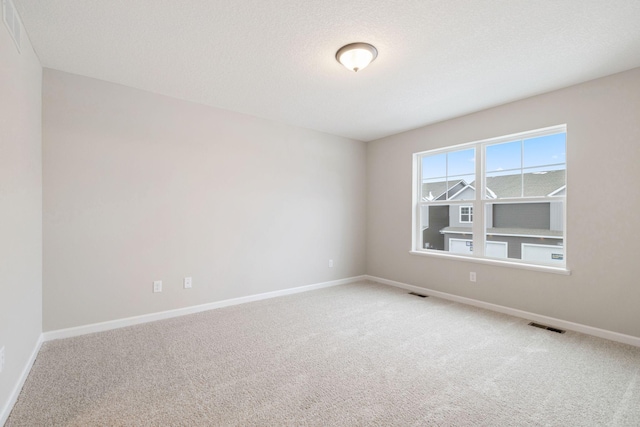 23225 Creekview Ct, Rogers, MN 55374 - carpeted spare room featuring baseboards