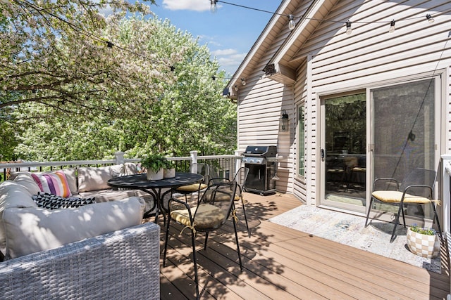 326 Lady Slipper Ln, Vadnais Heights, MN 55127 - wooden terrace with a grill, outdoor dining area, and an outdoor hangout area
