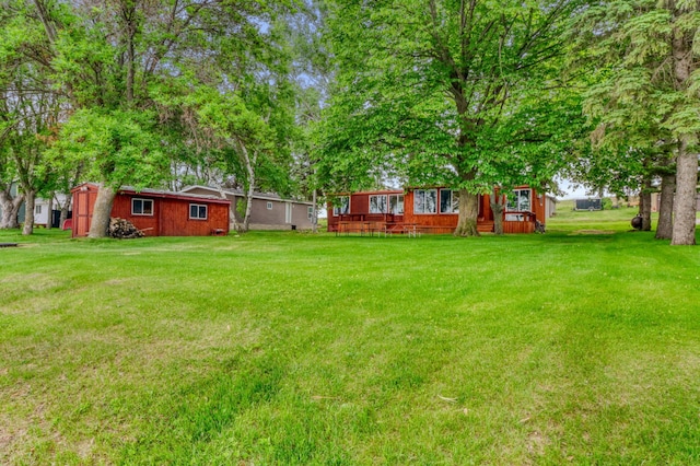 24505 Twilight Ln, Lida Twp, MN 56572 - view of green lawn featuring an outbuilding
